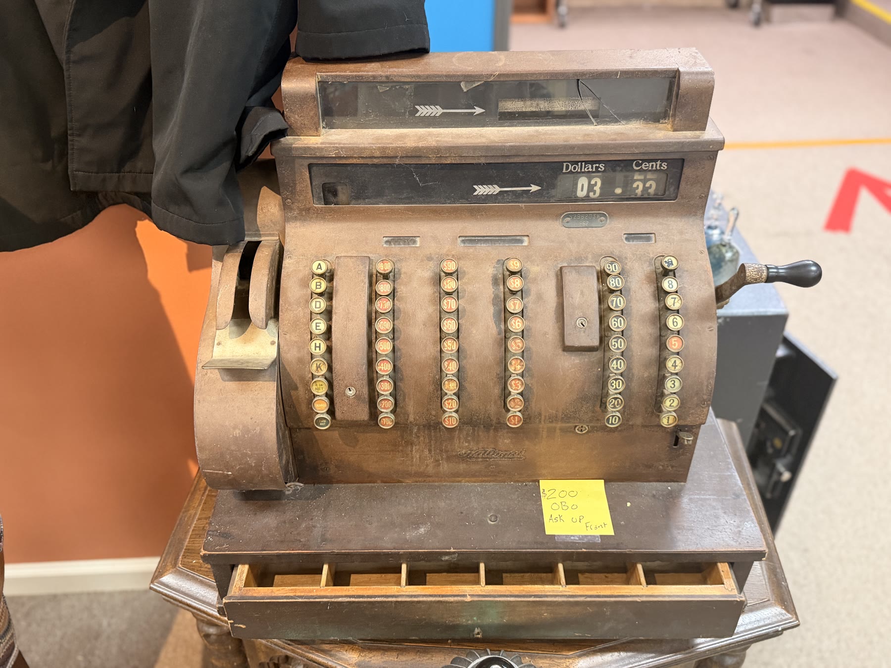 Antique brass cash register priced at two hundred dollars or best offer